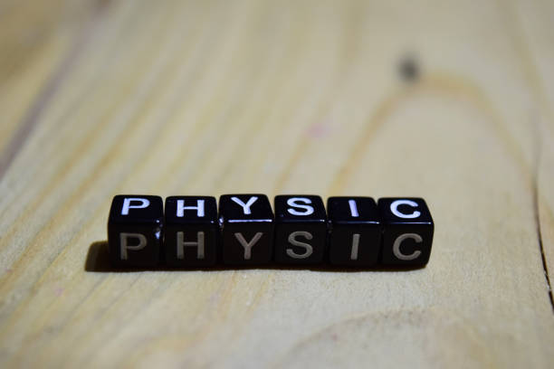 física, escrita em blocos de madeira - disfunção física - fotografias e filmes do acervo