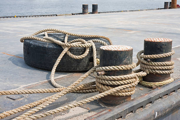 Pontoon with bollard, tied in the harbor  bollard pier water lake stock pictures, royalty-free photos & images