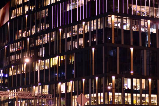 istock Office building at night. Late night at work. 1046666546