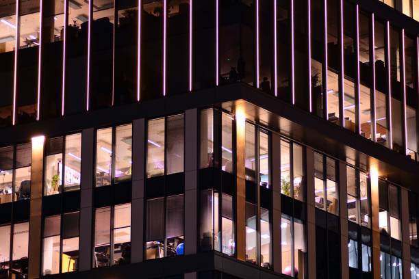 istock Office building at night. Late night at work. 1046666604