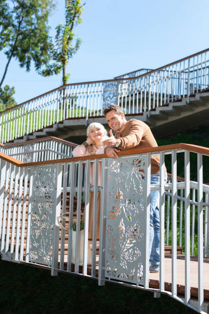 istock Pleased people spending weekend together in park 1046667258