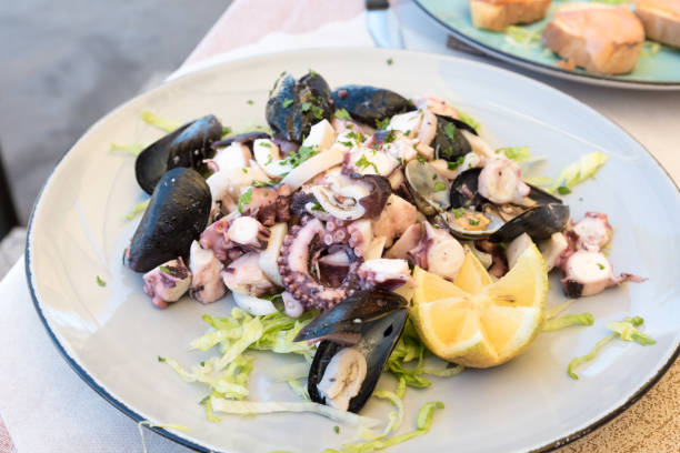 istock Sea salad with lemon 1046667586