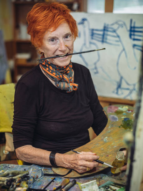 istock Senior woman artist at work 1046670040