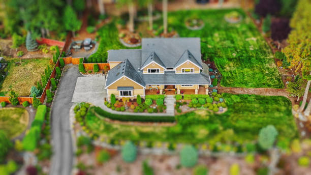 House Exterior Aerial Tilt-shift Photo Aerial photo of an American suburban home with tilt-shift lens effect for tiny model effect tilt shift stock pictures, royalty-free photos & images