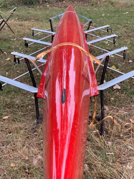istock Red boat on a  meadow waiting for the race 1046670798