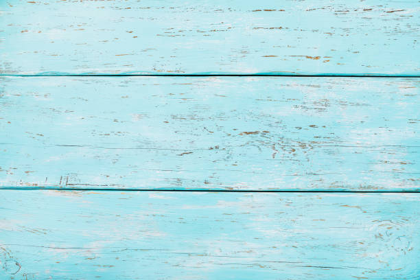 istock Texture of an old tree with shabby turquoise paint 1046677502