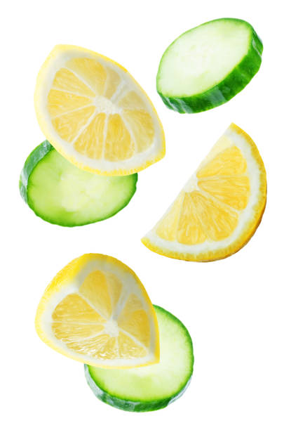istock Flying Liemon slices with Cucumber slices 1046683196