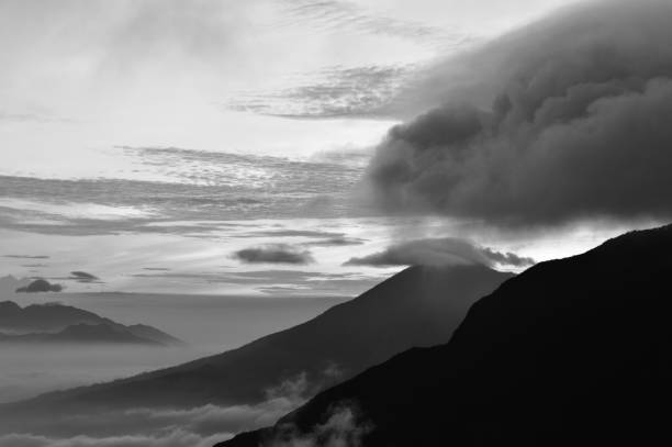 istock Beautiful black and white mountain scenery, sunrise and clouds 1046683326