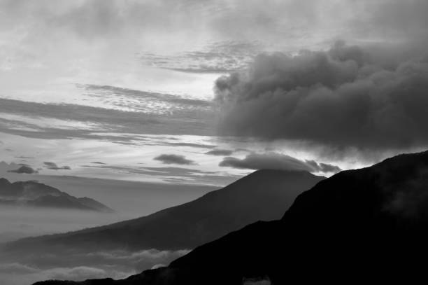 istock Beautiful black and white mountain scenery, sunrise and clouds 1046687750