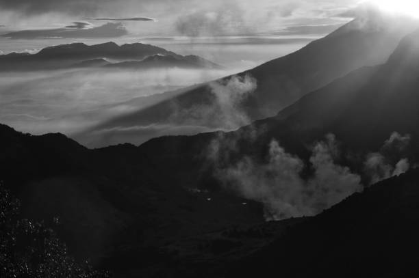 istock Beautiful black and white mountain scenery, sunrise and clouds 1046691312