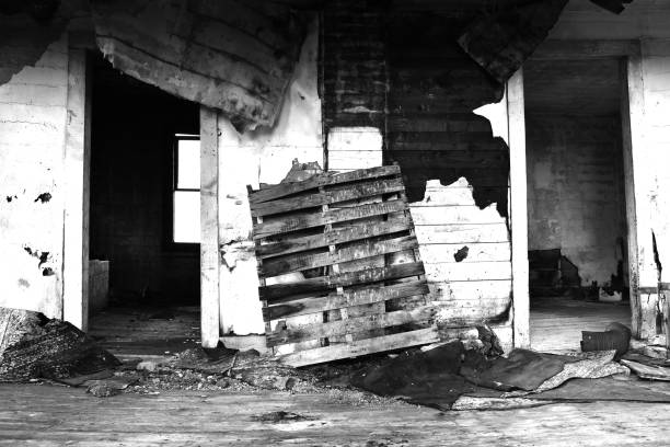 istock Creepy Abandoned House Interior 1046691534