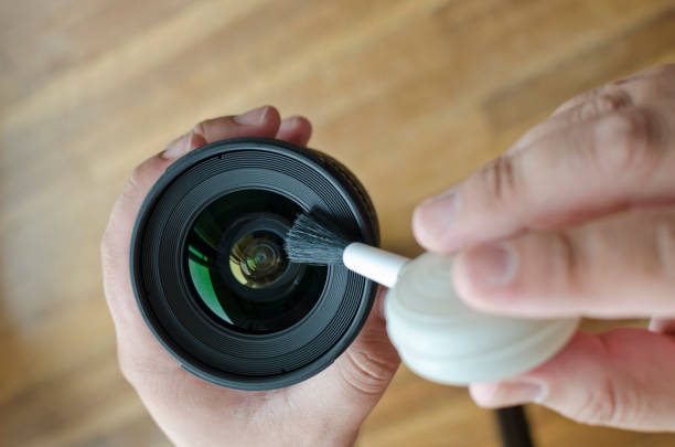 istock cleaning lens photography 1046694130