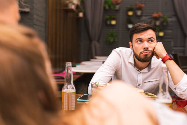 istock Sad young man looking into the distance and feeling bored 1046694166