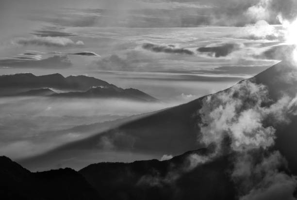 istock Beautiful black and white mountain scenery, sunrise and clouds 1046694168