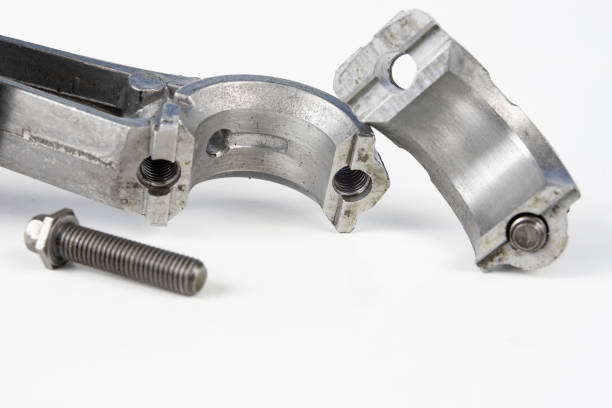 istock A small combustion engine piston on a white table. Spare parts for mechanics. White background. 1046699796