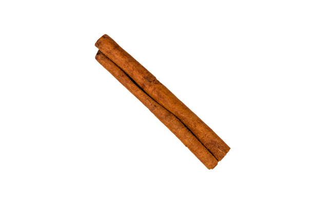 istock Brown cinnamon stick isolated on a white background 1046699822