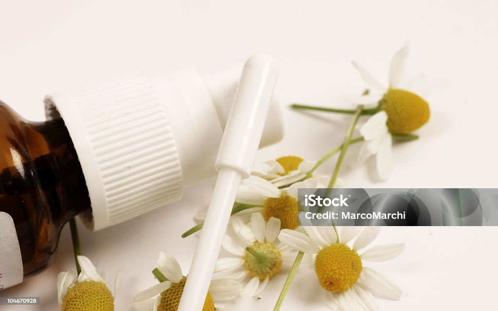 chamomile spray Chamomile spray on white background Alternative Medicine Stock Photo