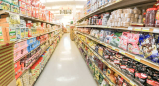 Panoramic blurry background candy and cookies at Asian supermarket in America stock photo