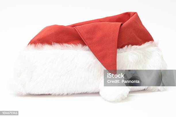 Foto de Santas Hat e mais fotos de stock de Boné - Boné, Branco, Chapéu