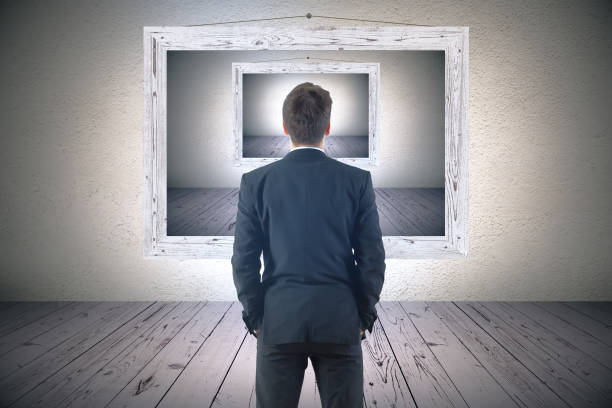 istock businessman looking at picture frame 1046715088