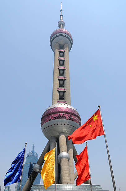 istock ShangHai Pearl Tower with Chinese National Flag 104672656