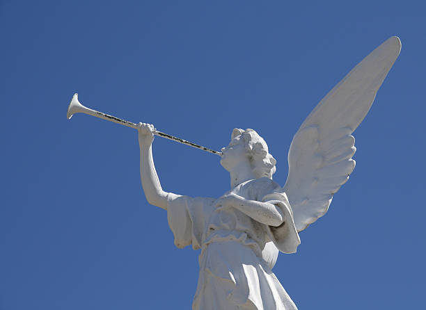 istock Statue of angel blowing horn 104673174
