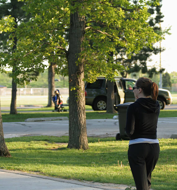 istock Woman walking in park 104673196
