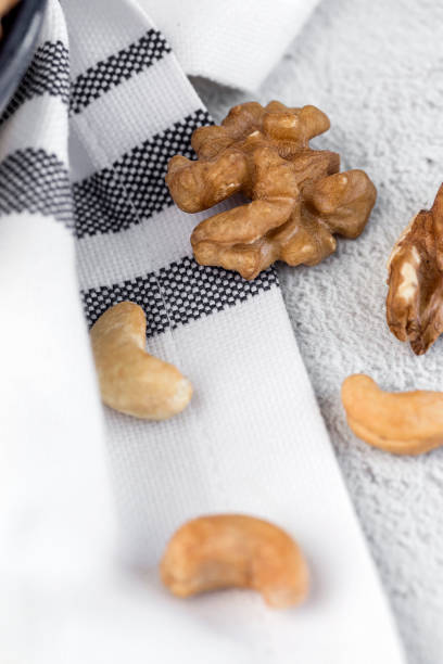 istock Assortment of nuts. On a light background. 1046743160