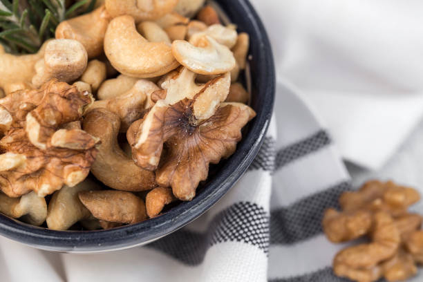 istock Assortment of nuts. On a light background. 1046743162