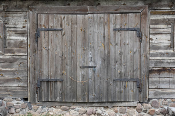 istock Old wooden barn door 1046743272