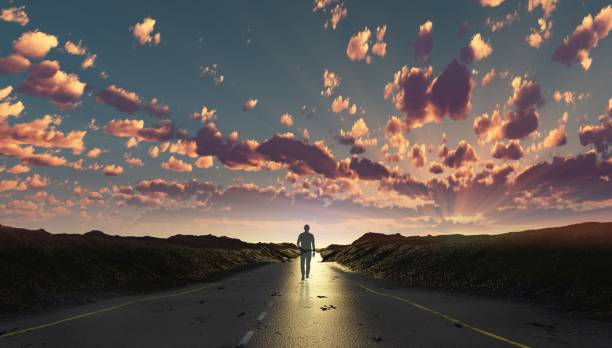 istock Sunset, road, man walking 1046743422