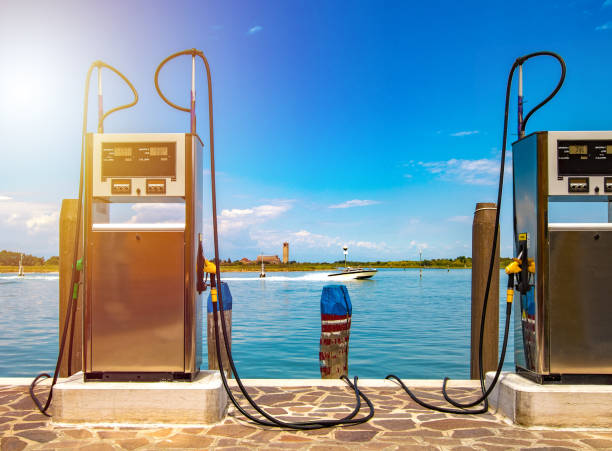 Boat petrol station, marine fuel tank station Boat petrol station, marine fuel tank station gas tank photos stock pictures, royalty-free photos & images