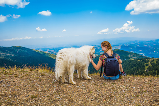 Woman enjoy in nature with her dog