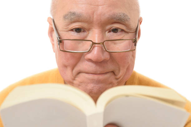 istock Japanese senior who is reading 1046760388