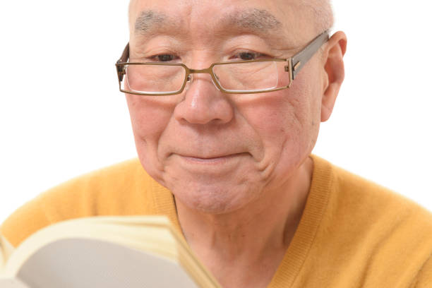 istock Japanese senior who is reading 1046760392