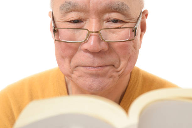 istock Japanese senior who is reading 1046760396