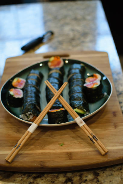 Homemade Sushi on a Plate with Chopsticks