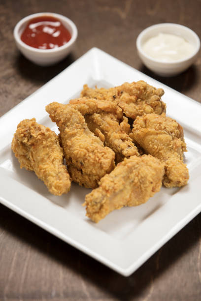 istock homemade crispy fried chicken on white 1046770384