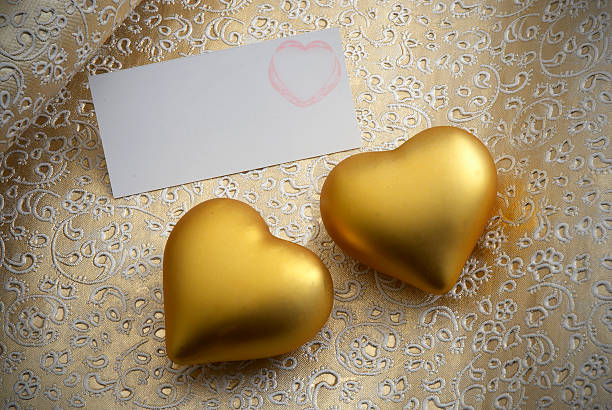 Golden cuori di San Valentino carta - foto stock