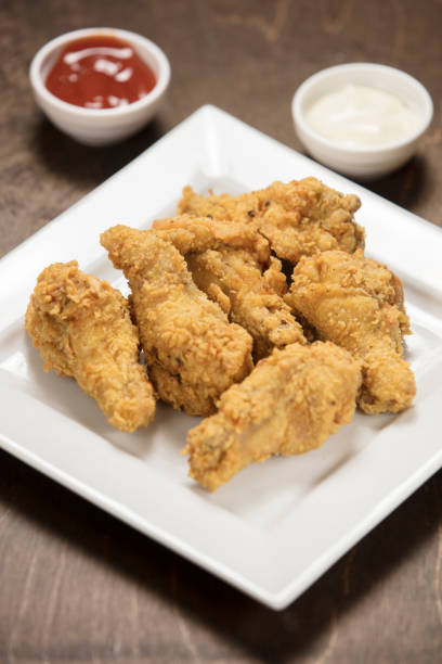 istock homemade crispy fried chicken on white 1046774724