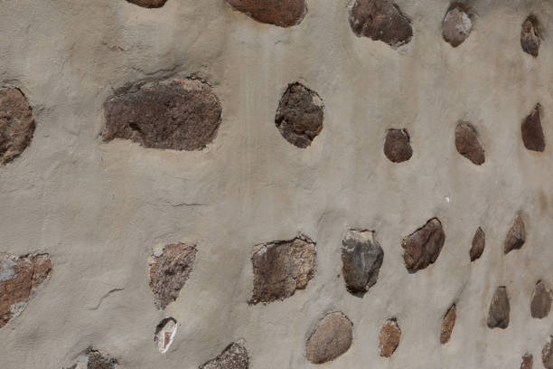 istock large stones in concrete background 1046774848