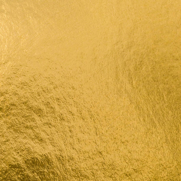 istock Gold foil leaf shiny wrapping paper texture background for wall paper decoration element 1046786634