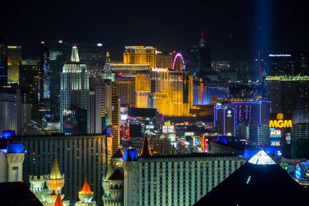 Panoramic aerial view of Las Vegas strip at night Las Vegas, USA - April 2018: Panoramic aerial view of the Las Vegas strip with casinos and hotels at night. Night view of Las Vegas from the hotel window. las vegas pyramid stock pictures, royalty-free photos & images