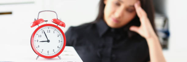istock Tired and exhausted woman have a lot of work with documents fall asleep 1046787620