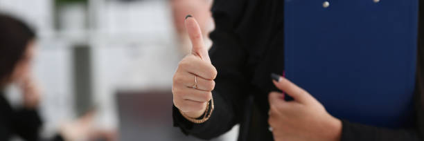 istock Female arm show OK or confirm during conference 1046788198