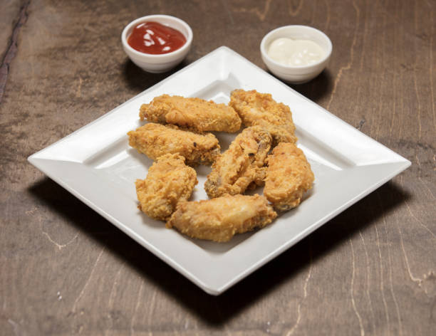 istock homemade crispy fried chicken on white 1046798272