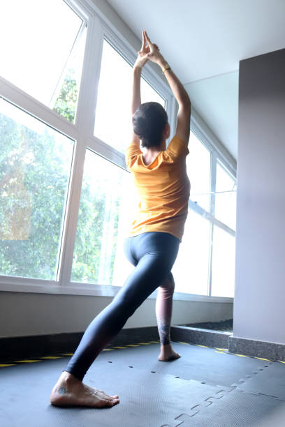 istock Woman doing Yoga 1046829652