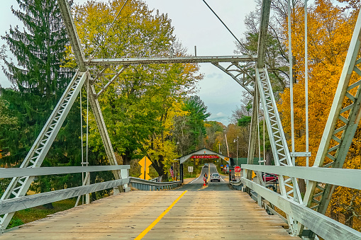 Dingmans Ferry Bridge across the Delaware River in the Poconos Mountains, connecting the states of Pennsylvania and New Jersey, USA