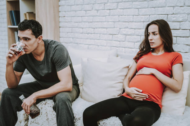 istock Motherhood. Man Drink Alcohol. Depressed. Husband. 1046833022