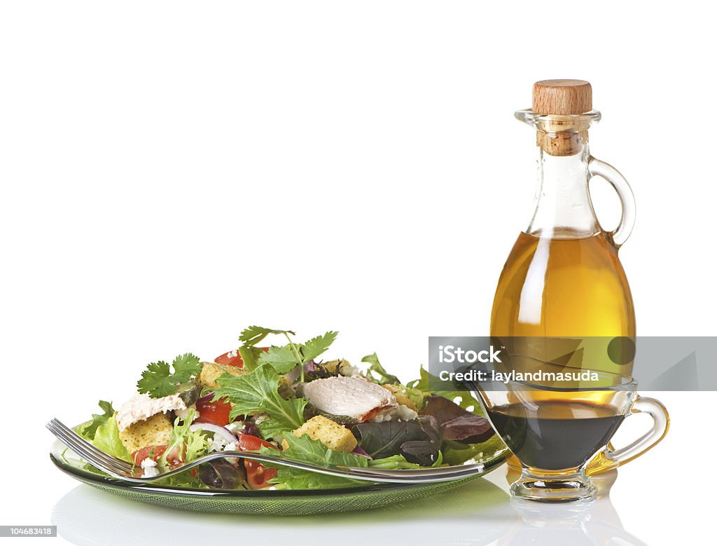 ミックスグリーンサラダ、オイルと酢 - バルサミコ酢のロイヤリティフリーストックフォト